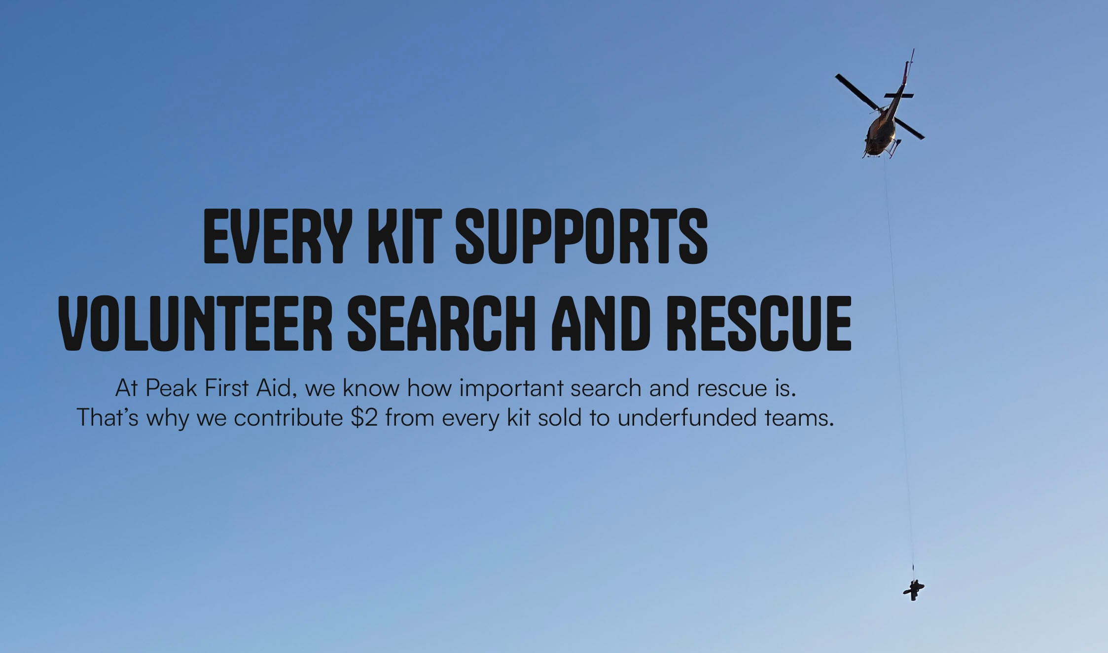 A helicopter flying into blue sky with the text "Every Kit Supports Volunteer Search and Rescue"